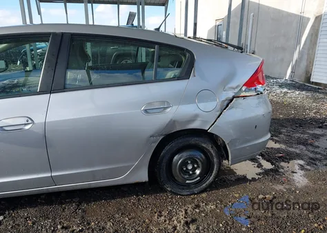 2010 Honda Insight Ex z USA, uszkodzony, nr VIN JHMZE2H78AS009393